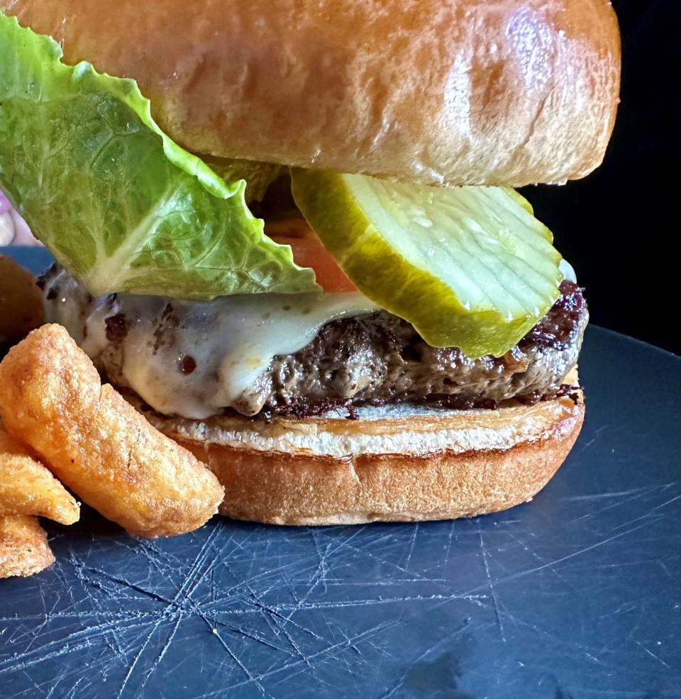 The Pub Burger at the Bat Cave Gastropub in Melbourne was comprised of meat and cheese, plus exceptionally fresh pickles, lettuce and tomato.