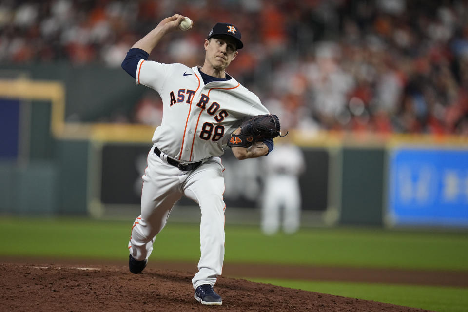 Houston Astros relief pitcher Phil Maton throws during the sixth inning of Game 1 in baseball's World Series between the Houston Astros and the Atlanta Braves Tuesday, Oct. 26, 2021, in Houston. (AP Photo/Ashley Landis)