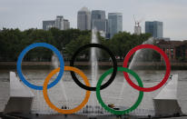 Olympic rings with cycle powered fountains are installed on The River Thames at Greenwich on August 1, 2012 in Greenwich, England. Visitors to The Old Royal Naval College can use harnessed bicycles to power fountains during the day and help illuminate the giant Olympic rings at night. (Photo by Peter Macdiarmid/Getty Images)