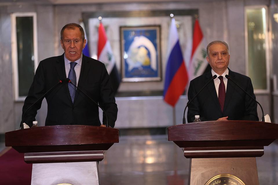 Iraqi Foreign Minister Mohamed Alhakim, right, and Russian Foreign Minister Sergey Lavrov hold a press conference at the Ministry of Foreign Affairs in Baghdad, Iraq, Monday, Oct. 7, 2019. (AP Photo/Hadi Mizban)