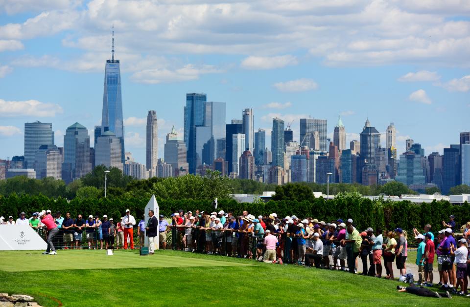 JERSEY CITY, NEW JERSEY - AUGUST 11: Jon Rahm of Spain plays his shot from the first tee  during the final round of The Northern Trust at Liberty National Golf Club on August 11, 2019 in Jersey City, New Jersey. (Photo by Jared C. Tilton/Getty Images)