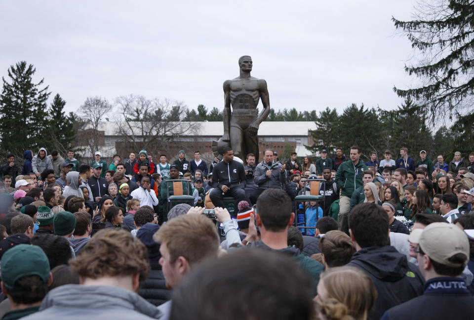 Michigan State's Miles Bridges, left, and men's basketball coach Tom Izzo speak during an NCAA college basketball news conference, Thursday, April 13, 2017, in East Lansing, Mich. Bridges, a 6-foot-7 forward from Flint, Mich., announced he is returning for his sophomore season. (AP Photo/Al Goldis)