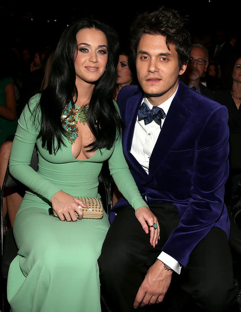 katy in mint green dress sitting next to john at the grammys