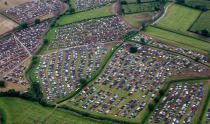 Thousands of cars are stacked up in the festival car parks. (SWNS)