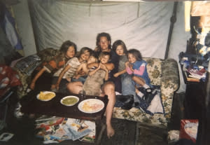 Rosalynn McGinnis in 2010 with six of her kids in a tent in Mexico