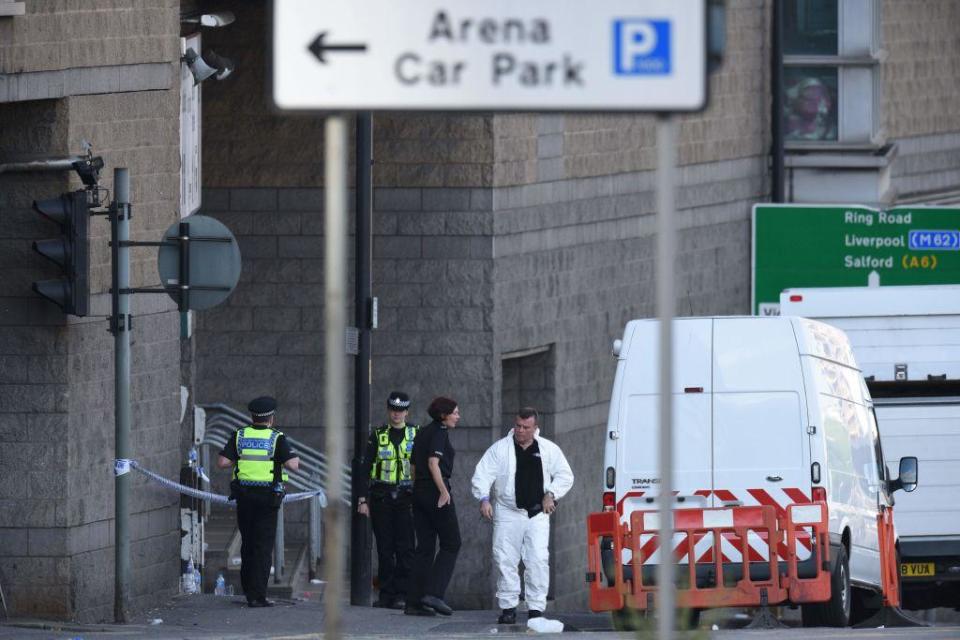 Members of the emergency services work near Manchester Arena following a terror attack at an Ariana Grande concertOli Scarff/AFP/Getty Images