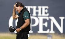 Golf - British Open - Phil Mickelson of the U.S. reacts after a missed birdie putt on the 18th green during the first round - Royal Troon, Scotland, Britain - 14/07/2016. REUTERS/Craig Brough