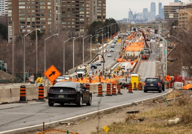 Construction work along Eglinton Avenue, where a new 19-kilometre light-rail transit line is facing another possible delay in its opening. (Michael Wilson/CBC - image credit)