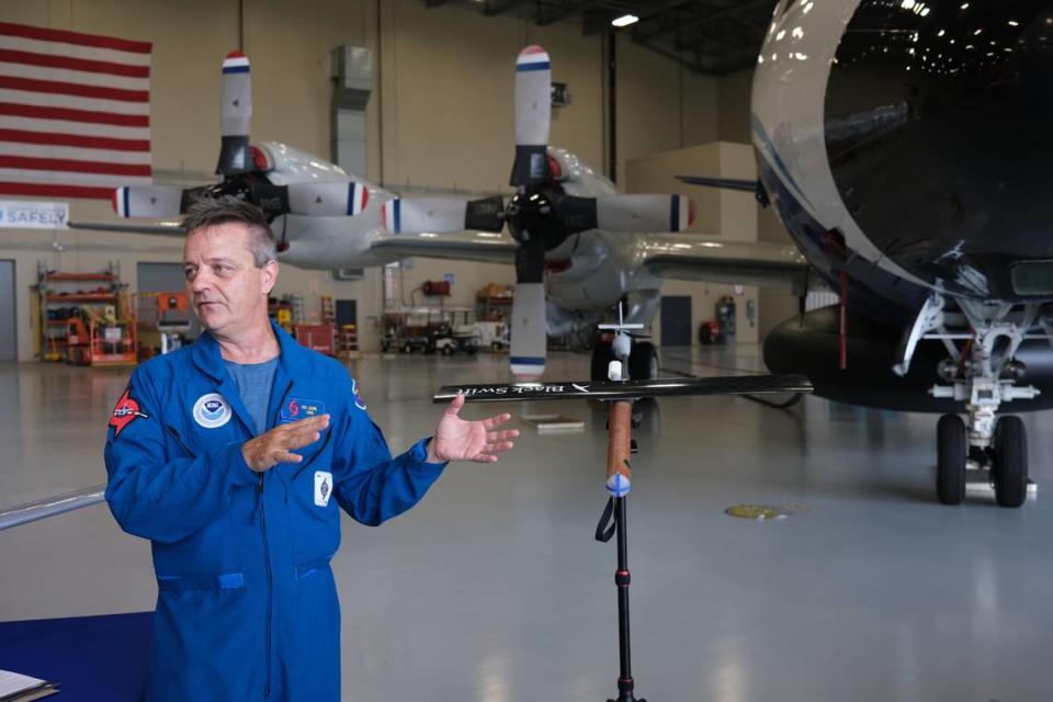 Joseph Cione, lead meteorologist with NOAA’s Hurricane Research Division, discusses how drones can help measure conditions inside of hurricanes at NOAA’s Aircraft Operations Center in Lakeland on June 27, 2023. 