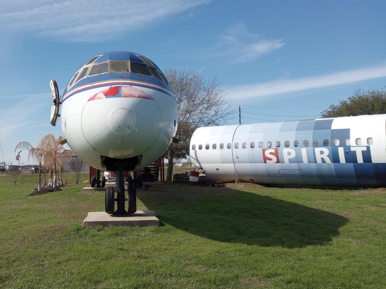 McDonnell Douglas MD-80 and DC-9 Spirit Airlines fuselages that make up Joe Axline's plane house.