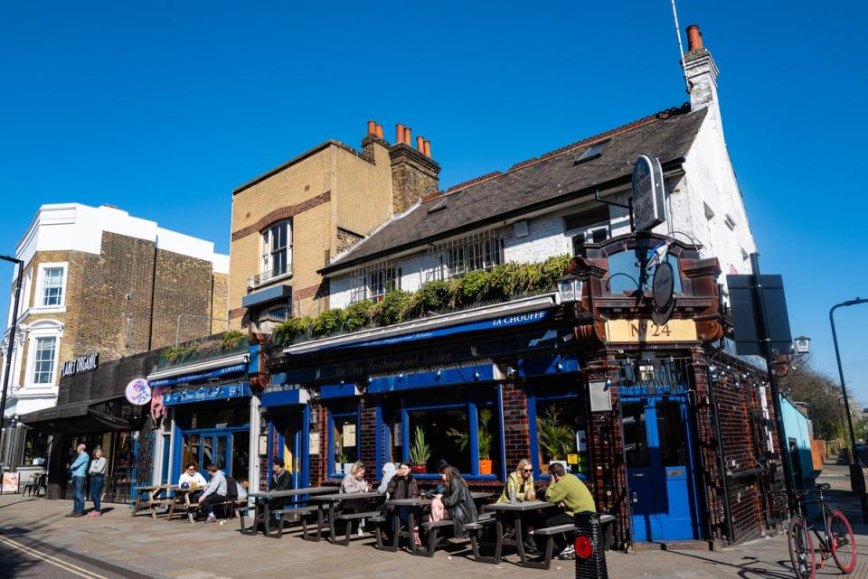 Local favourite: Broadway Market is great for people-watching on the weekend. Pictured here is The Dove Pub (Daniel Hambury/Stella Pictures Ltd)