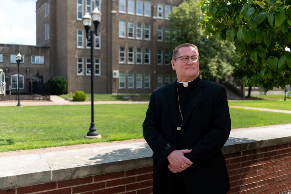 Bishop Louis Tylka poses for a photograph outside of the Catholic Diocese of Peoria Spalding Pastoral Center on Wednesday, August 4, 2021. Bishop Tylka has been in his current position for about a year.