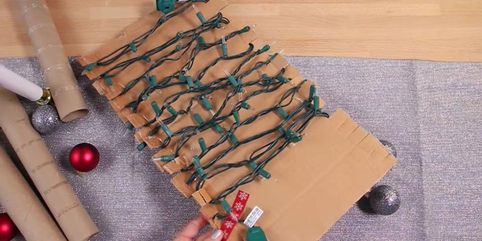 Wrap lights around cardboard.