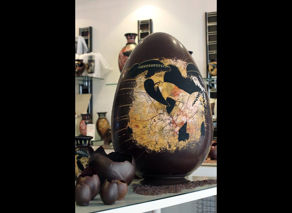 High-end decorated chocolate Easter eggs crafted by the French chocolatier family Colas, are displayed in the Jicara Chocolat boutique on April 22, 2011 in Paris on the eve of Easter celebrations. The French chocolatier has chosen Ancient Greece as this year theme for Easter delicacies.   AFP PHOTO THOMAS COEX 