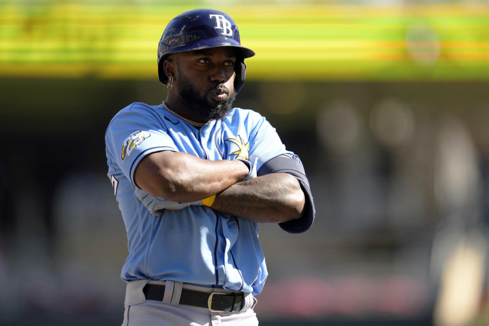 Tampa Bay Rays' Randy Arozarena celebrates while rounding the bases after hitting a solo home run during the ninth inning of a baseball game against the Minnesota Twins, Wednesday, Sept. 13, 2023, in Minneapolis. (AP Photo/Abbie Parr)