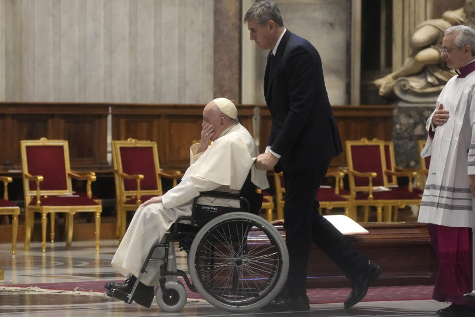 Pope Francis leaves after the funeral ceremony for Australian Cardinal George Pell in St. Peter's Basilica, at the Vatican, Saturday Jan. 14, 2023. Cardinal Pell died on Tuesday at a Rome hospital of heart complications following hip surgery. He was 81. (AP Photo/Gregorio Borgia)