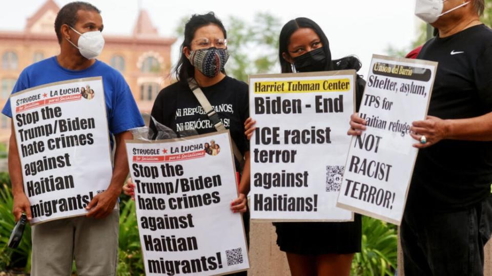 Activists protest against the treatment of Haitian migrants at the southern border on September 23, 2021 in Los Angeles, California. (Photo by Mario Tama/Getty Images)