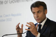 French President Emmanuel Macron speaks during a media conference at the end of an EU Summit at Prague Castle in Prague, Czech Republic, Friday, Oct 7, 2022. European Union leaders converged on Prague Castle Friday to try to bridge significant differences over a natural gas price cap as winter approaches and Russia's war on Ukraine fuels a major energy crisis. (AP Photo/Darko Bandic)