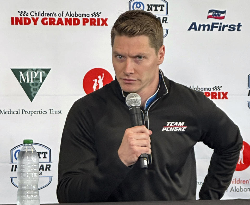 Reigning Indianapolis 500 champion Josef Newgarden talks in Birmingham, Ala., Friday, April 26, 2024, about his recent disqualification in the season-opening IndyCar auto race. Newgarden is preparing for Sunday's race at Birmingham's Barber Motorsports Park. (AP Photo/John Zenor)