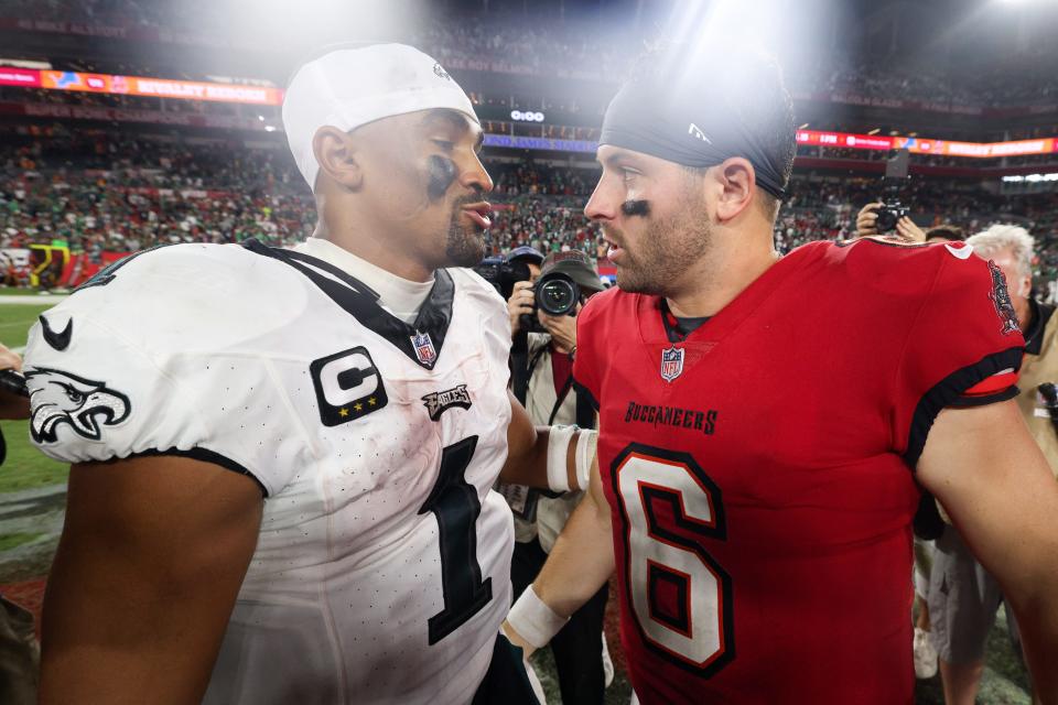 Philadelphia Eagles quarterback Jalen Hurts (1) and Tampa Bay Buccaneers quarterback Baker Mayfield shake hands after he Eagles' 25-11 win in Week 3 at Raymond James Stadium.