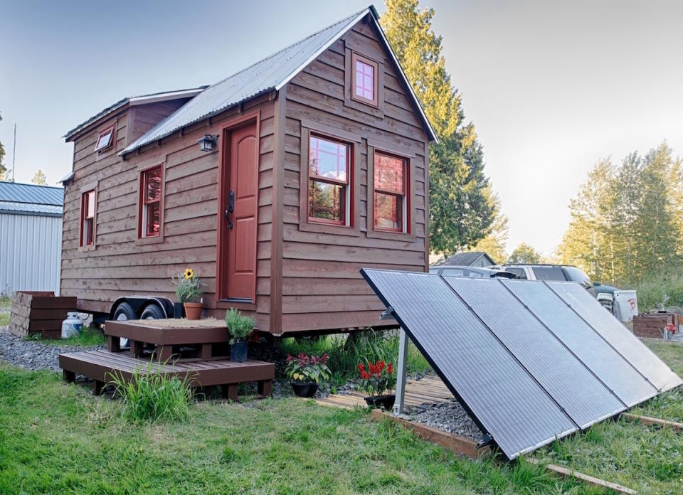 <body> <p>Occupying scarcely 200 square feet, this postage-stamp-size <a rel="nofollow noopener" href=" http://www.bobvila.com/slideshow/home-home-on-the-road-10-houses-on-wheels-47007?bv=yahoo" target="_blank" data-ylk="slk:wooden shack on wheels;elm:context_link;itc:0;sec:content-canvas" class="link ">wooden shack on wheels</a> manages to squeeze in a comfortable ground floor and stylish sleeping loft. Thanks to the gabled roof, the loft offers Seattle-based builders and homeowners Chris and Malissa Tack ample room to stretch out, and the home's 11 windows and skylights flood the interior with sunshine and warmth.</p> <p><strong>Related: <a rel="nofollow noopener" href=" http://www.bobvila.com/slideshow/18-american-towns-every-old-house-lover-needs-to-see-50465?#.WD-oVaIrKRs?bv=yahoo" target="_blank" data-ylk="slk:18 American Towns Every Old-House Lover Needs to See;elm:context_link;itc:0;sec:content-canvas" class="link ">18 American Towns Every Old-House Lover Needs to See</a> </strong> </p> </body>