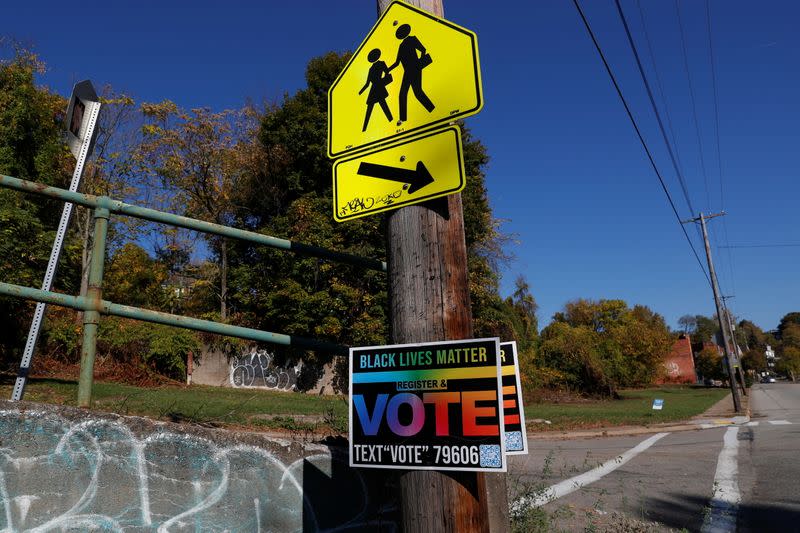 A Black Lives Matter sign urging people to vote hangs from a pole, amid the coronavirus disease (COVID-19) pandemic, in Pittsburgh, Pennsylvania