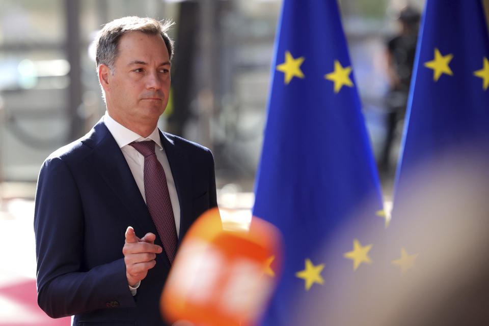 Belgium's Prime Minister Alexander De Croo arrives for an EU summit in Brussels, Thursday, June 23, 2022. European Union leaders are expected to approve Thursday a proposal to grant Ukraine a EU candidate status, a first step on the long toward membership. The stalled enlargement process to include Western Balkans countries in the bloc is also on their agenda at the summit in Brussels. (AP Photo/Olivier Matthys)