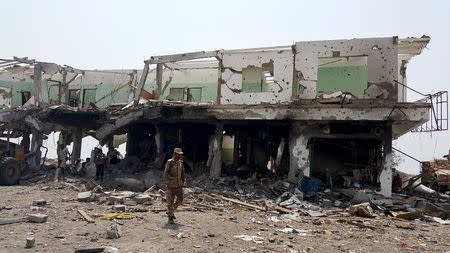 Southern Resistance fighters rest in the al-Alam entrance of Yemen's southern port city of Aden, after seizing control from Houthi fighters July 31, 2015. REUTERS/Stringer