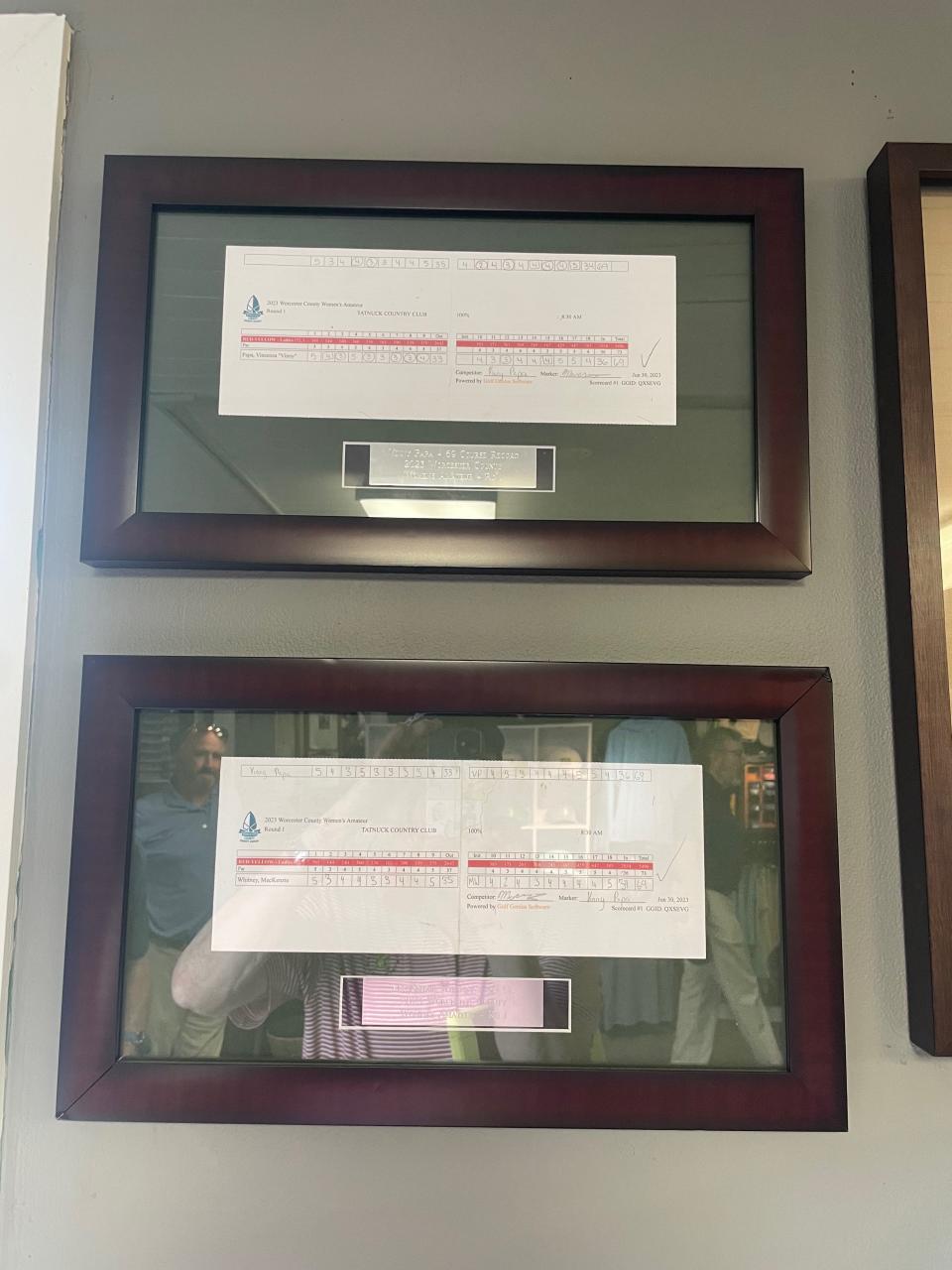 The course-record scorecards of Vinny Papa and Mackenzie Whitney hang in the pro shop at Tatnuck CC.