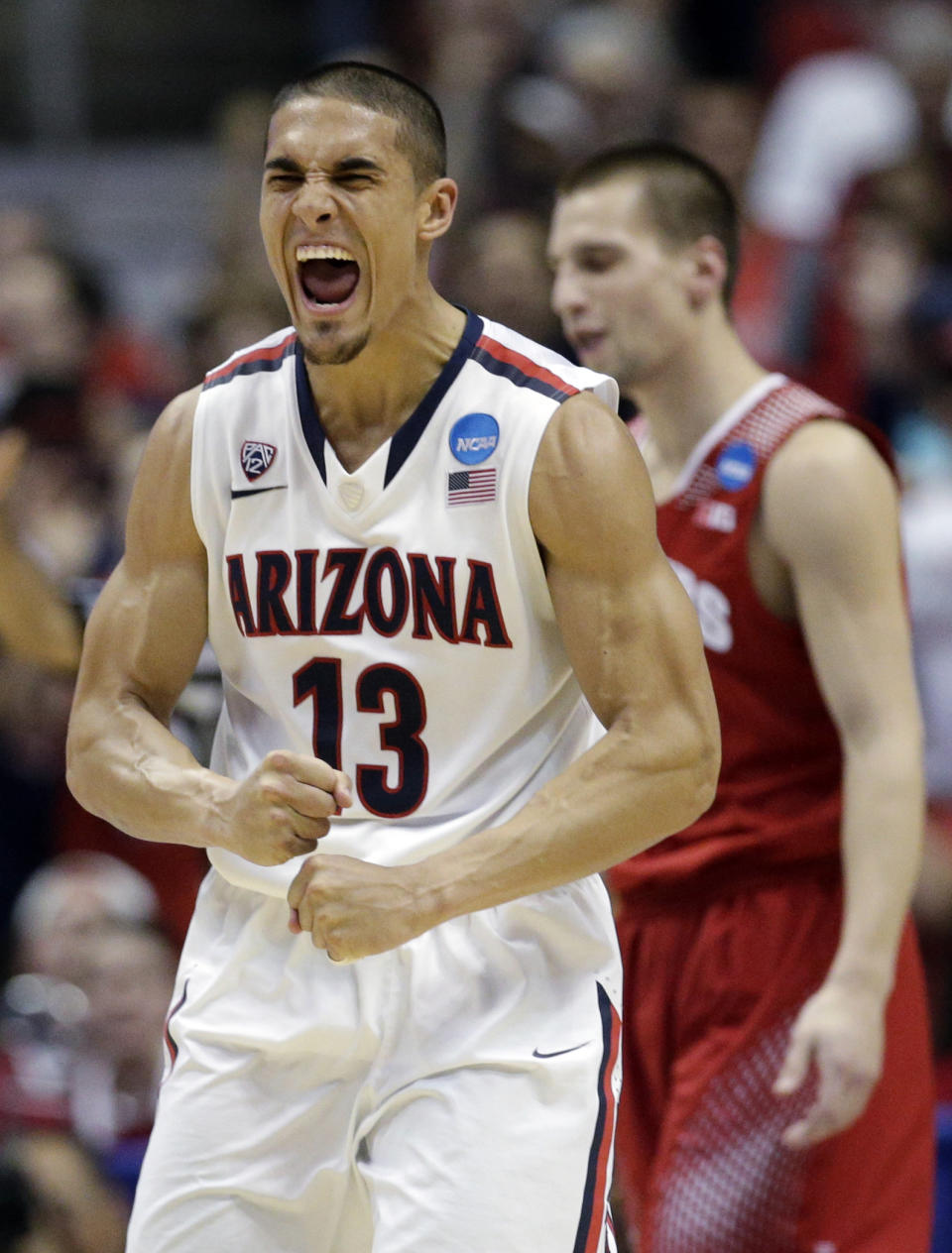 Arizona's Nick Johnson reacts to a turnover during the second half in a regional final NCAA college basketball tournament game against Wisconsin, Saturday, March 29, 2014, in Anaheim, Calif. (AP Photo/Jae C. Hong)