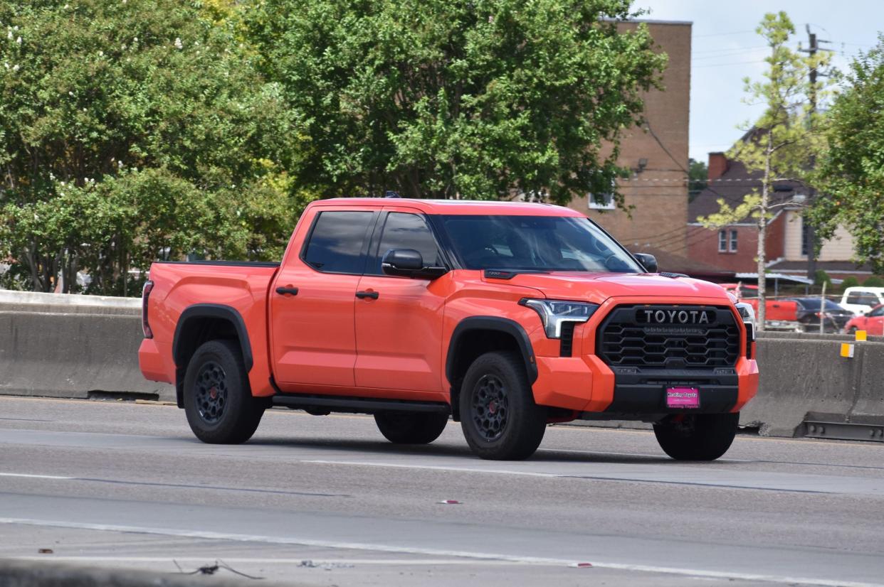 Red 2023 Toyota Tundra on Gulf Freeway, Interstate 45 (1-45) in Houston, Tx