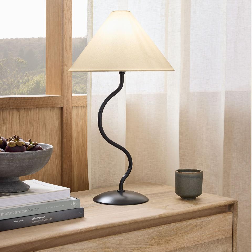 <p><a href="https://go.redirectingat.com?id=74968X1596630&url=https%3A%2F%2Fwww.westelm.com%2Fproducts%2Fzig-zag-table-lamp-h12173&sref=https%3A%2F%2Fwww.goodhousekeeping.com%2Fhome-products%2Fg60357640%2Fbest-table-lamps%2F" rel="nofollow noopener" target="_blank" data-ylk="slk:Shop Now;elm:context_link;itc:0;sec:content-canvas" class="link ">Shop Now</a></p><p>Zigzag Table Lamp</p><p>westelm.com</p><p>$99.00</p>