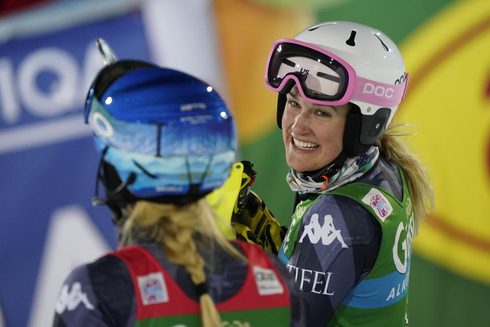 FILE - United States' Paula Moltzan, right, smiles to winner United States' Mikaela Shiffrin after taking second place during an alpine ski, World Cup women's slalom in Semmering, Austria, Thursday, Dec. 29, 2022. When Paula Moltzan finished second behind Mikaela Shiffrin for the U.S. ski team’s first 1-2 finish in a women’s World Cup slalom in more than half a century recently, it was easy to assume that her more successful teammate was her main inspiration. (AP Photo/Giovanni Auletta, File)