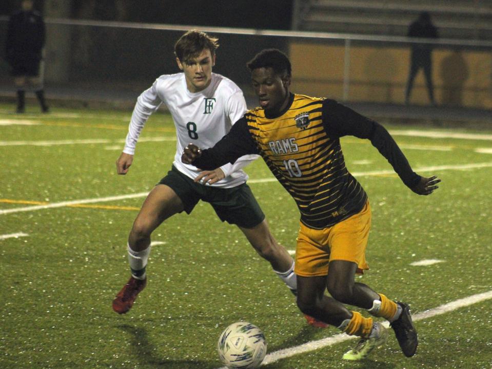 Englewood forward Zion Wise (10) dribbles against the Fleming Island defense during a Jan. 16 game.