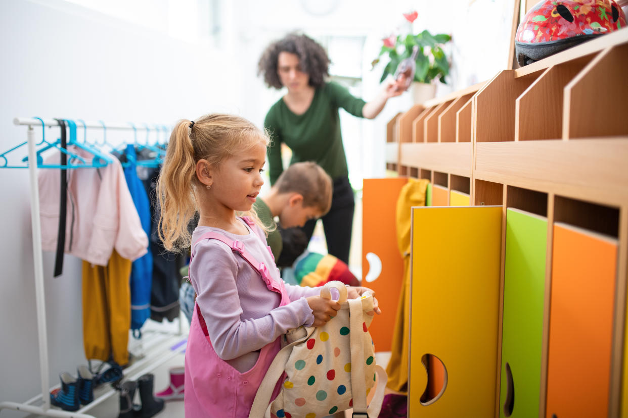 Children in cloakroom getting ready