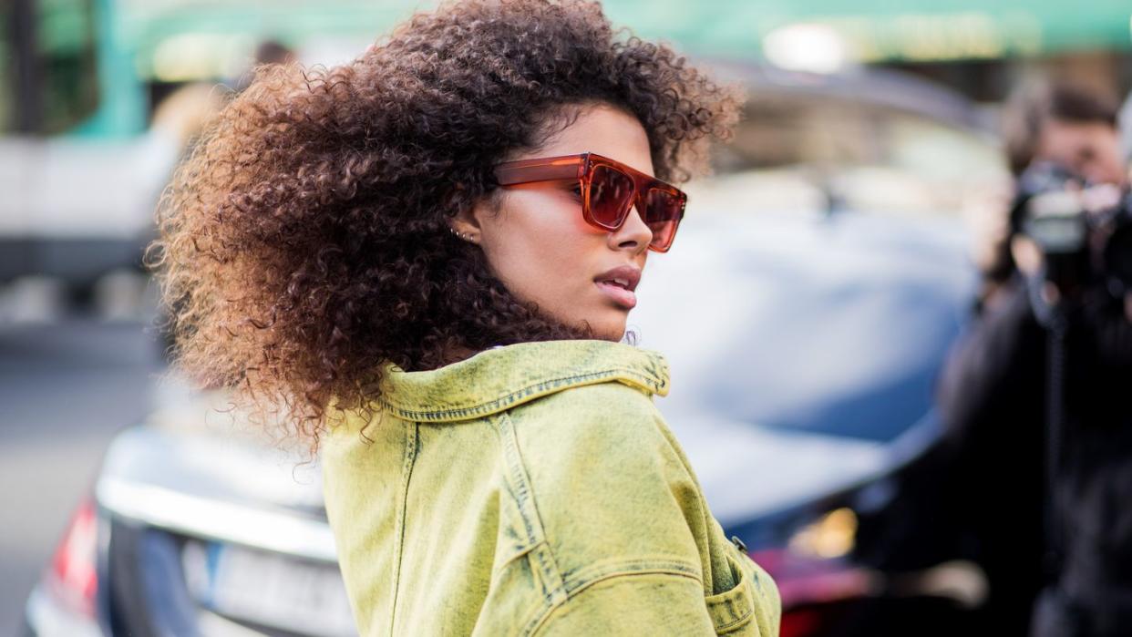 paris, france   march 05 tina kunakey is seen outside stella mccartney during paris fashion week womenswear fallwinter 20182019 on march 5, 2018 in paris, france photo by christian vieriggetty images