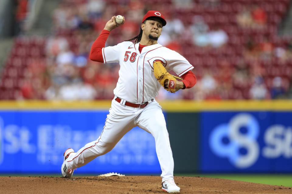 Cincinnati Reds' Luis Castillo throws during the first inning of the team's baseball game against the Los Angeles Dodgers in Cincinnati, Wednesday, June 22, 2022. (AP Photo/Aaron Doster)
