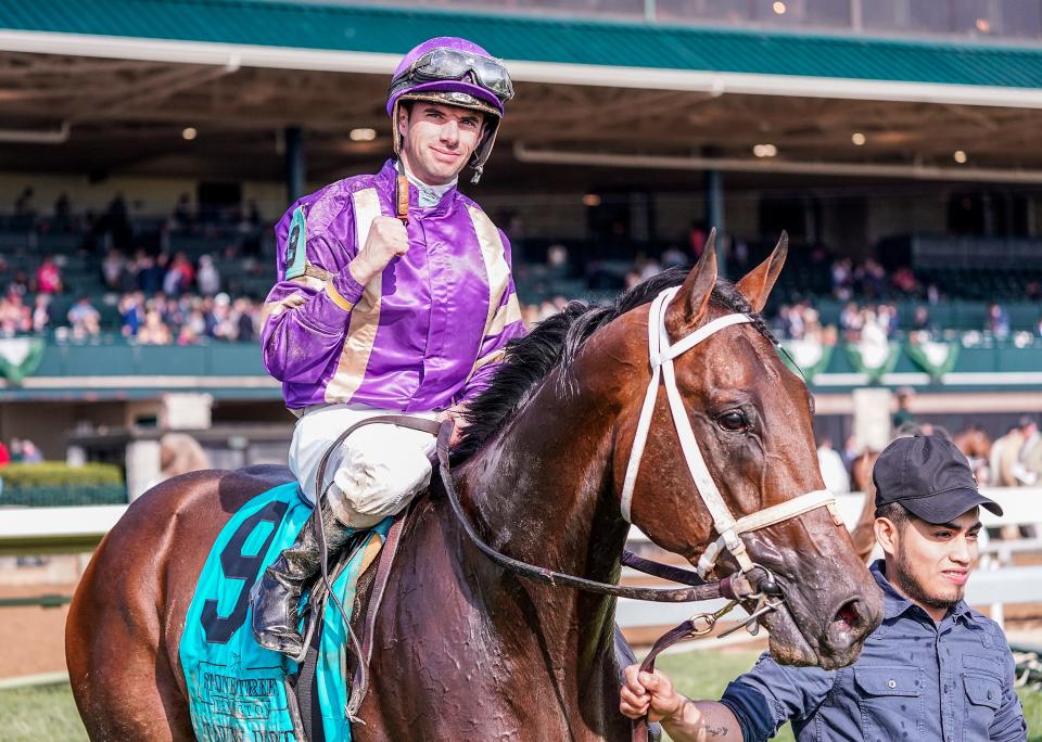 Brad Cox-trained, Tawny Port, with Florent Geroux up, wins the Stonestreet Lexington Stakes at Keeneland on Saturday, April 16, 2022