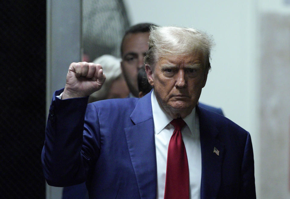 Former President Donald Trump returns to court after a break in his trial at Manhattan criminal court in New York, Tuesday, April 30, 2024. (Eduardo Munoz/Pool Photo via AP)