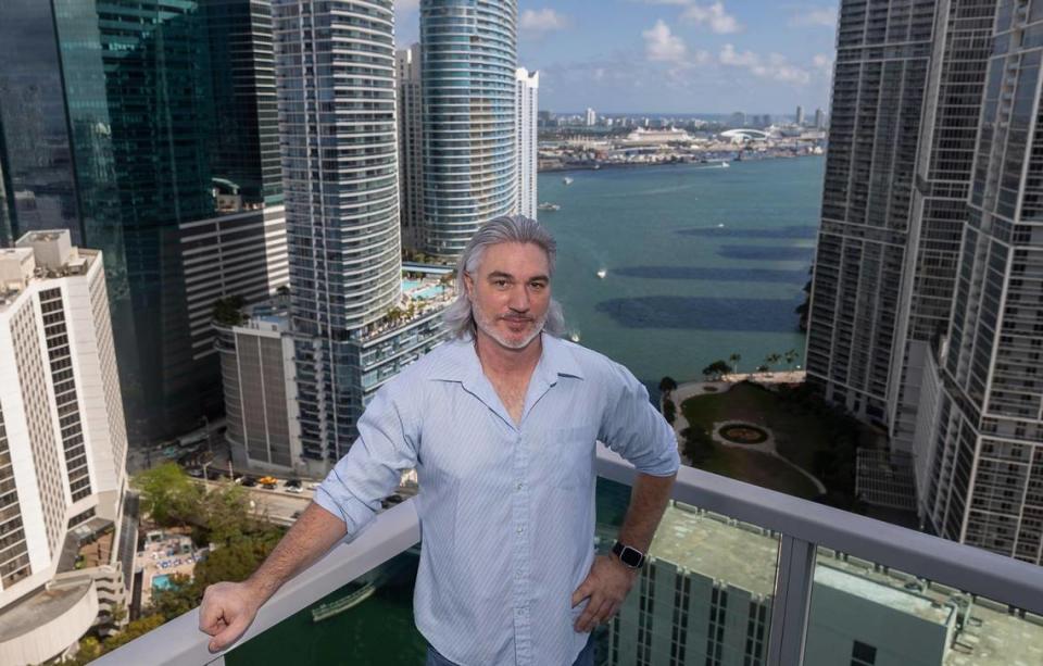 Geoff Bain’s balcony at the Brickell on the River tower overlooks the site of the Miami Circle, visible over his shoulder to the right, and an excavation at the adjacent site of a planned residential tower complex that has unearthed a trove of prehistoric indigenous 
finds, including artifacts dating back to the dawn of human civilization 7,000 years ago. Bain says developers Related Group and the city of Miami should preserve a portion of the site as a park or museum.