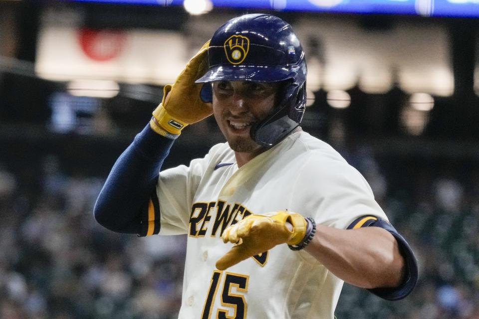 Milwaukee Brewers' Tyrone Taylor reacts after hitting an RBI single during the fourth inning of a baseball game against the Colorado Rockies Monday, Aug. 7, 2023, in Milwaukee. (AP Photo/Morry Gash)