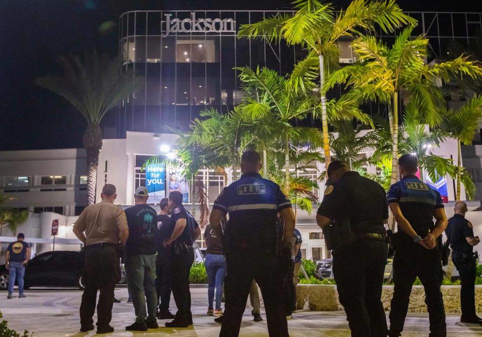 Police officers mourn at Jackson Memorial Hospital, Cesar Echeverry, the Miami-Dade Police Detective who was gravely shot in Liberty City on Monday, after his death was announced on August 17, 2022.