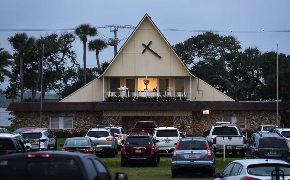 <span class="caption">Car horns mark ‘amens’ at drive-in church services, such as this one in Daytona Beach, Florida.</span> <span class="attribution"><a class="link " href="https://www.gettyimages.com/detail/news-photo/people-in-cars-attend-easter-sunday-services-at-the-daytona-news-photo/1209761916?adppopup=true" rel="nofollow noopener" target="_blank" data-ylk="slk:Paul Hennessy/SOPA Images/LightRocket via Getty Images;elm:context_link;itc:0;sec:content-canvas">Paul Hennessy/SOPA Images/LightRocket via Getty Images</a></span>