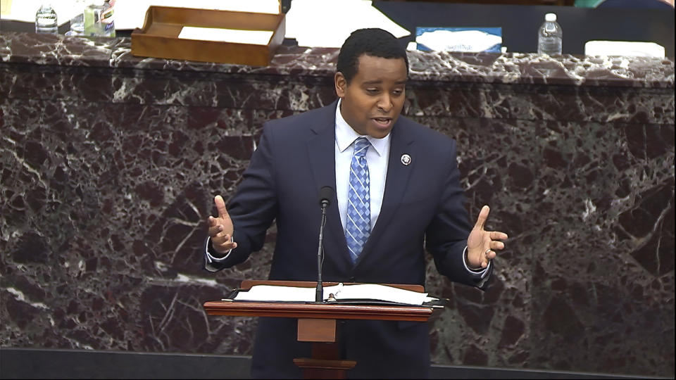 In this image from video, House impeachment manager Rep. Joe Neguse, D-Colo., speaks during closing arguments in the second impeachment trial of former President Donald Trump in the Senate at the U.S. Capitol in Washington, Saturday, Feb. 13, 2021. (Senate Television via AP)