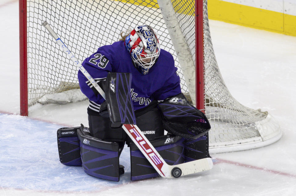 Minnesota goalie Nicole Hensley makes a save against Toronto during the third period of a PWHL hockey game Wednesday, Jan. 10, 2024, in St. Paul, Minn. (AP Photo/Bailey Hillesheim)