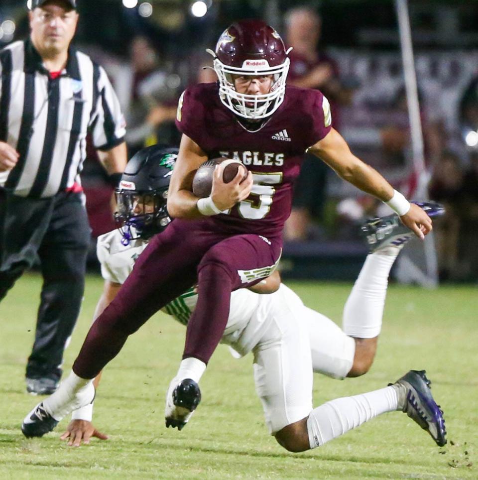 Niceville QB Kane Lafortune carries the ball for a first down during the Choctaw-Niceville football game played at Niceville.