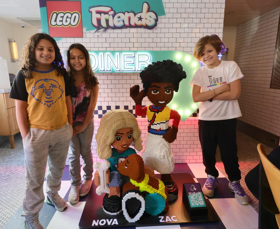 Visitors to LEGO Friends' diner experience on Feb. 18, 2023, in New York City.
