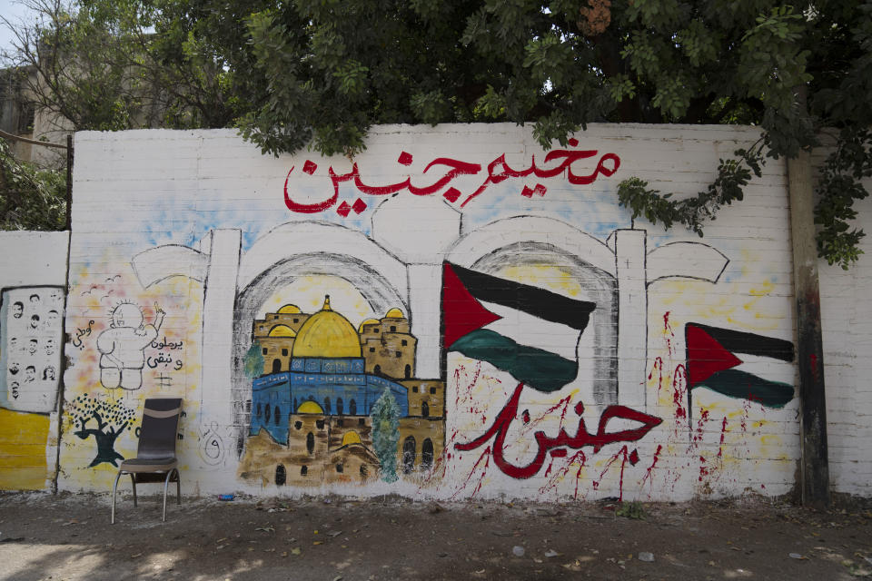 A mural that reads in Arabic "They will leave and we will stay, Jenin" in the occupied West Bank's Jenin refugee camp, Jenin, Sunday, Aug. 13, 2023. (AP Photo/Nasser Nasser)