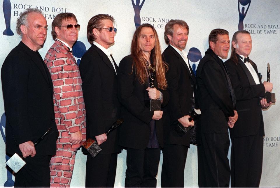 Bernie Leadon, Joe Walsh, Don Henley, Timothy Schmit, Don Felder, and Randy Meisner appear together after receiving their awards and being inducted into the Rock & Roll Hall of Fame, January 12, 1998 in New York. Randy Meisner, a founding member of chart-topping rock band the Eagles (AFP via Getty Images)