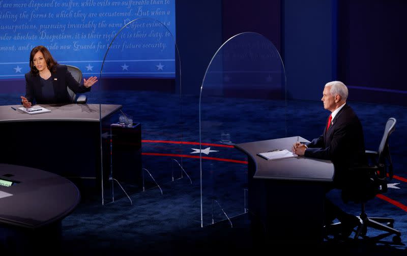 Democratic vice presidential nominee Senator Kamala Harris and U.S. Vice President Mike Pence participate in their 2020 vice presidential campaign debate in Salt Lake City